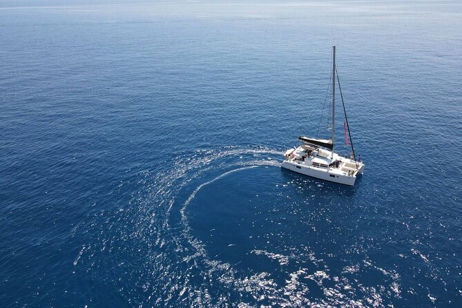 Ayia Napa: Sunset Catamaran Cruise with Lunch & Open Bar - Cape Greco With Sunbeds, Cliffs, and Rock Arches
