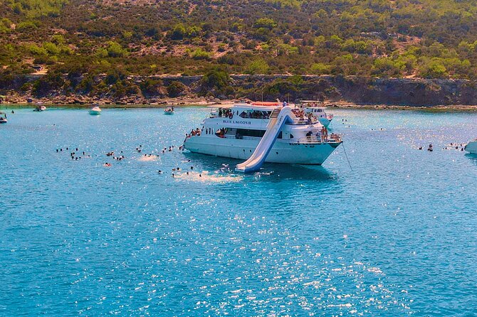 Blue Lagoon (Akamas) Bus & Boat Tour with Water Slide From Paphos - The Blue Lagoon swimming stop