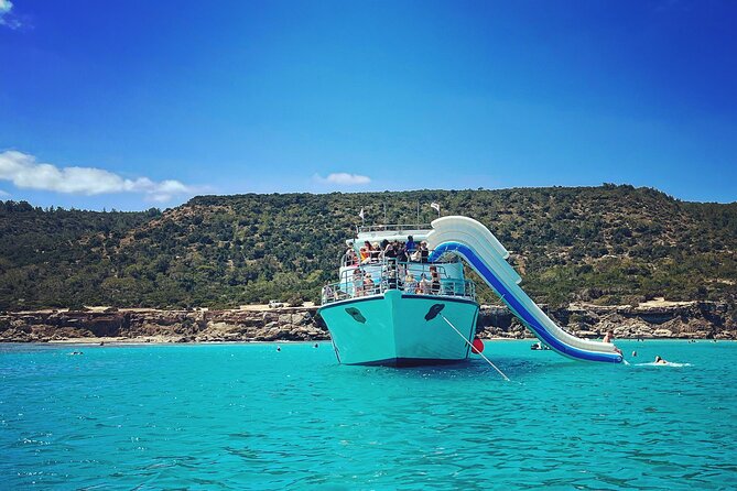 Blue Lagoon trip with slide & music departing from Latchi harbour - The Akamas coast from the water