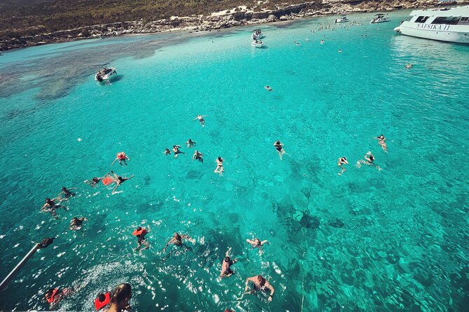 Blue Lagoon trip with slide & music departing from Latchi harbour - Drinks, fruit, and what the price really covers