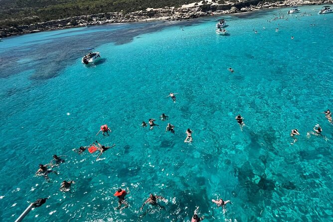 From Paphos: Blue Lagoon Cruise With Water Slide - Fruit and local wine after the swim