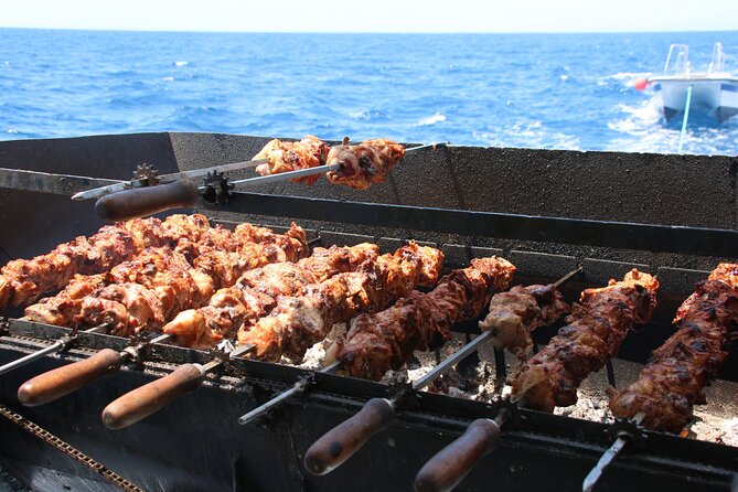 Half-Day Odyssey Guided Boat Safari with Lunch in Cyprus - Lunch, Wine, and the Onboard Mood