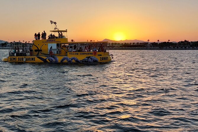 Larnaca Sunset Cruise with Unlimited Beers & Wine - Mackenzie Beach, swimming, and planes overhead