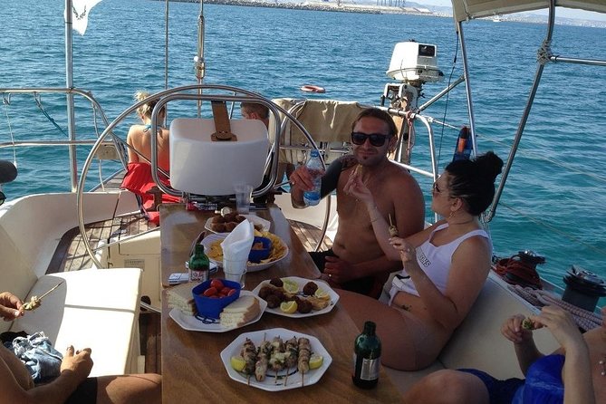 Private cruise with a sailing yacht Koursaros - Trying the helm with the skipper nearby